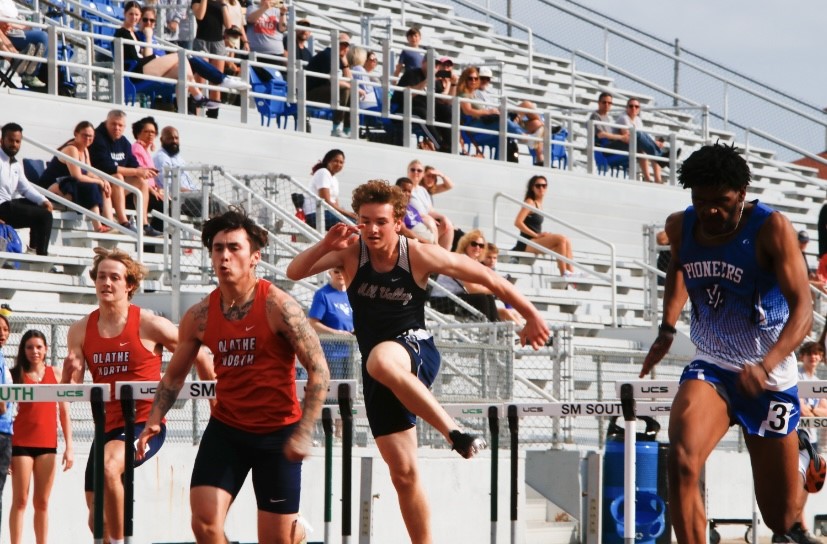 Competing in the 110 meter hurdle race, junior Finn Campbell recovers from clearing a hurdle in his path. Campbell would go on to finish ninth in the 100 meter hurdles with a time of 16.64 seconds.