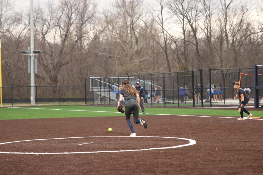 Junior Anna Stottlemyre runs towards the softball to retrieve after a hit.