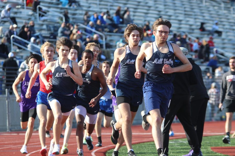 Breaking away from the pack of runners, junior Lucas Robins, sophomore AJ Vega, and seniors Chase Schieber and Nic Botkin settle into their places for the 1600-meter relay. Respectively, the boys places 10th, fourth, first and second.