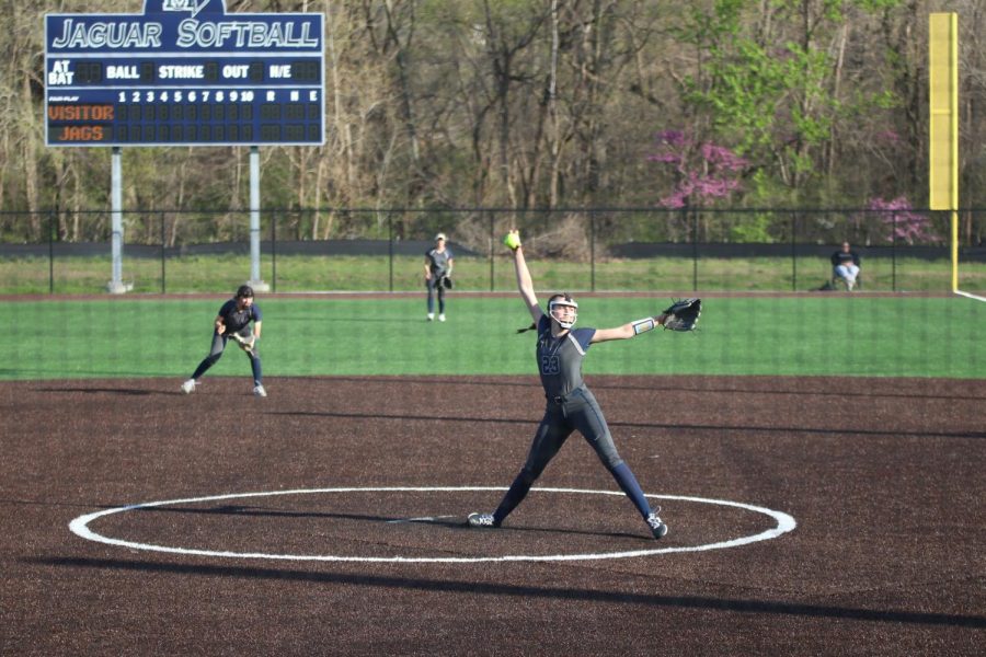 With her arm up in the air LaFon prepares to throw another pitch. The ladies came out on top with a score of 12-6