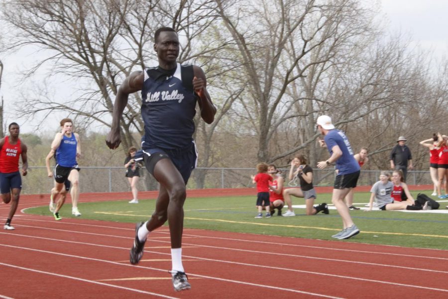 Pulling ahead of the pack, junior Nen Matlock strides out ot gain a lead in the 400 meter dash. Matlock finished in first place fo the 400 meter dash with a time of 51.62 seconds.