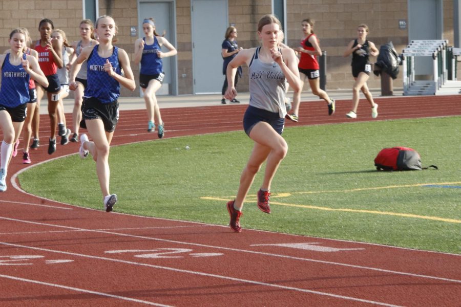 Senior Katie Schwartzkopf sets the pace for the start of the 800 meter race.