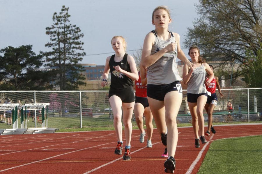 Freshman Meghan McAfee leads a pack of runner in the final 100 meter stretch of the 800 meter run. McAfee finished in sixth place with a time of 2:37 seconds.