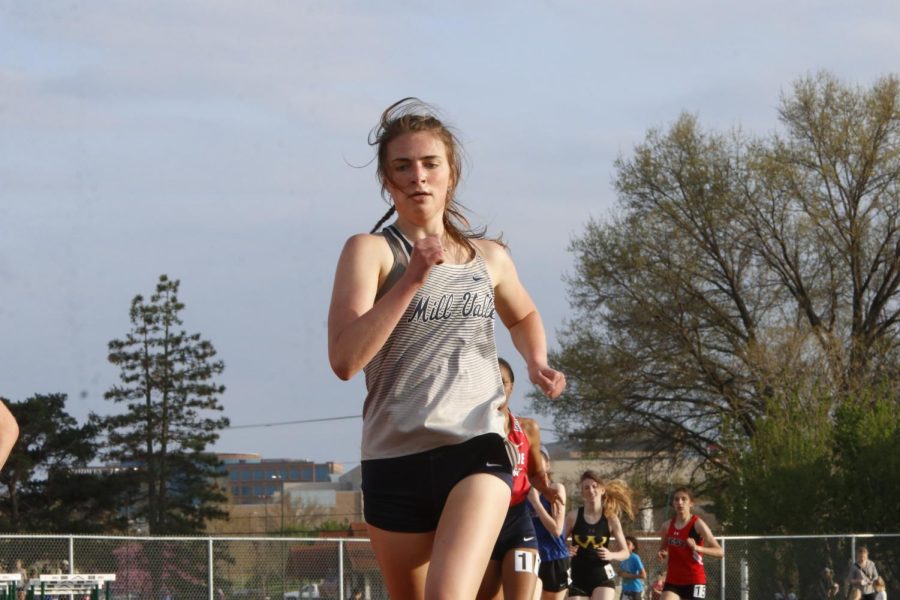 In the last stretch of the 800 meter run, senior Logan Piester sprints to the finish. Pfiester finished in ninth place with an 800 meter time of 2:39 seconds.