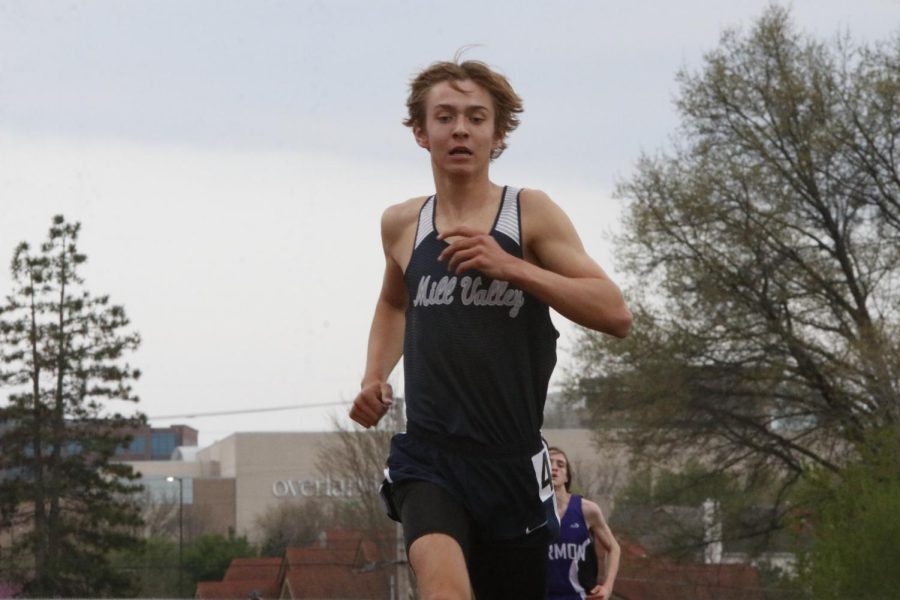 Freshman Carter Cline strides out to the finish line where he secured his fourth place in the 3200 meter run. Clines final time was 10:22 seconds.
