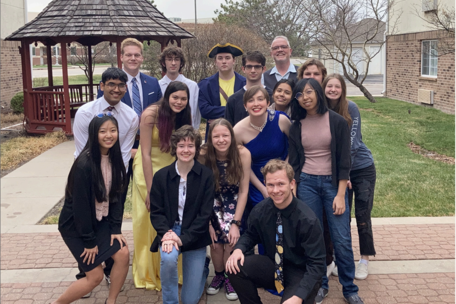 The+Science+Olympiad+team+poses+for+a+photo+during+their+Science+Prom.+