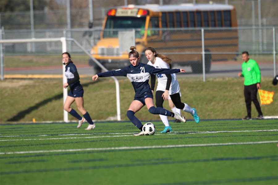 Sophomore Samantha Mullen passed the ball to her teammate to possibly make a play for the team, in their 10-0 win against Gardner Thursday, Mar. 31st.