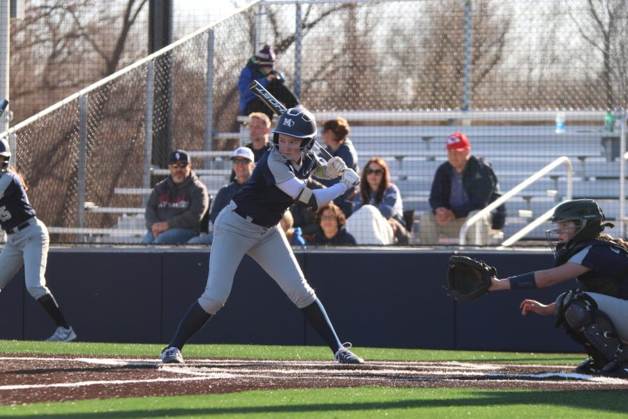 Up to bat, junior Haley Bryant gets in her batting stance, focusing on the pitcher to make a move during a varsity vs junior varsity scrimmage Thursday, Mar. 25th.