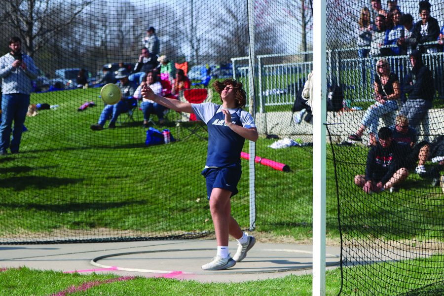 After gaining momentum, sophomore Sully Suderman releases the discus. 