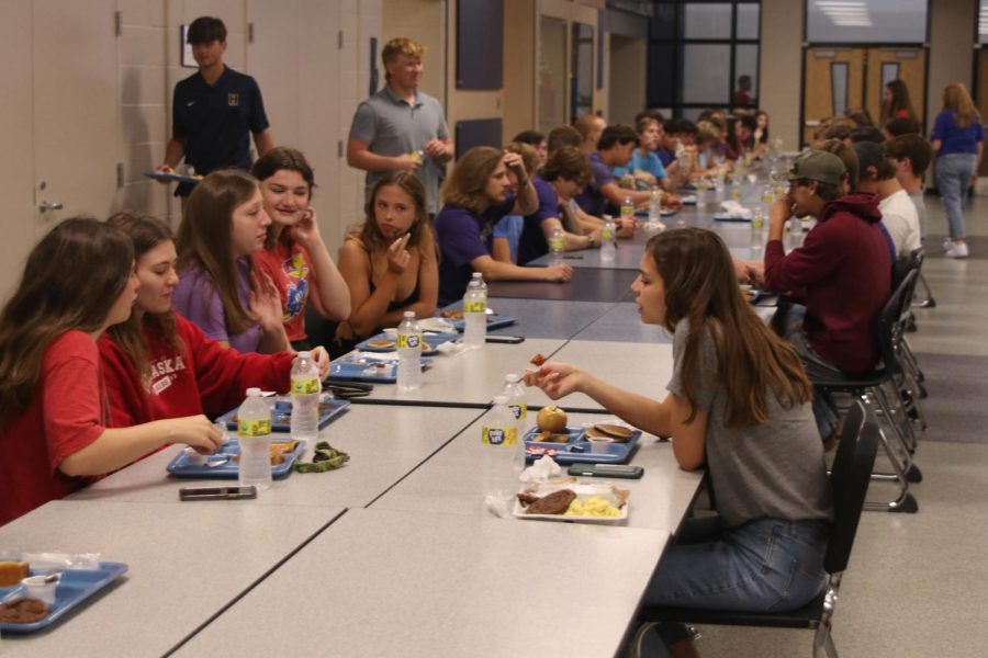 With their last breakfast at school sitting before them, seniors Lauren Payne, Quinn Franken and Allison Rader talk to each other across the table.  
