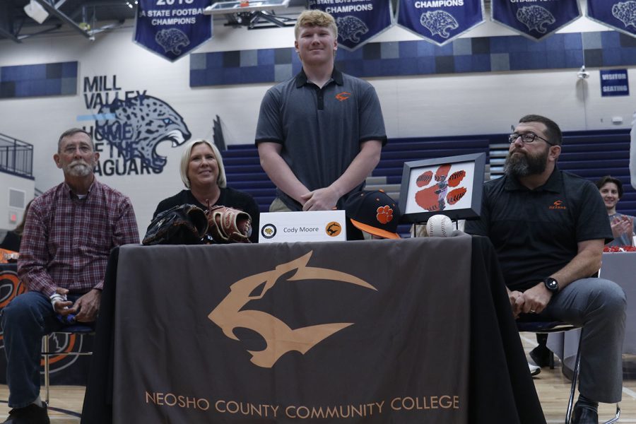 Senior Cody Moore signs to play baseball at Neosho County Community College.