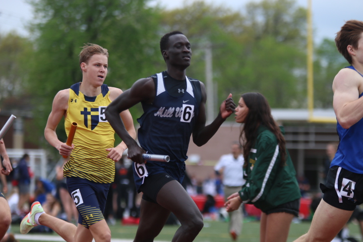 Junior Nen Matlock sets the pace for the first leg of the 4x800 meter relay. Matlock helped the relay team secure 12th place out of 18 schools.