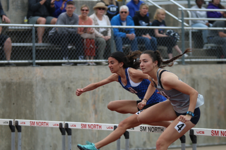 Looking ahead, senior Quincy Hubert clears the first hurdle in her path. Hubert would finish the 100 meter hurdle event in first place with a time of 14.94 seconds. Hubert is currently ranked in the state top 10 for her hurdle performance.