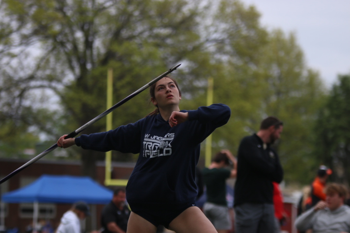 Angling her javelin upward, sophomore Anna Strack focuses on where she wants the javelin to land. Strack took 14th place in javelin out of 38 competitors.