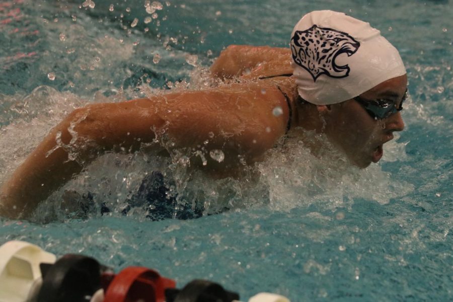 Competing in fly at Blue Valley Northwest, junior Eva Garcia Cuenca takes a breath on Thursday April 28.