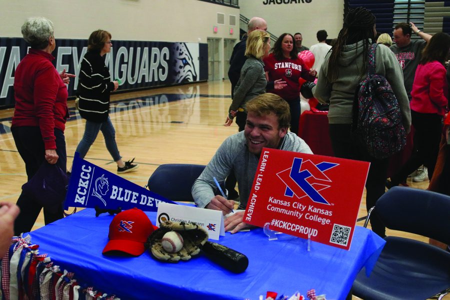 Senior Christian Ammann signs to play baseball at Kansas City Kansas Community College.
