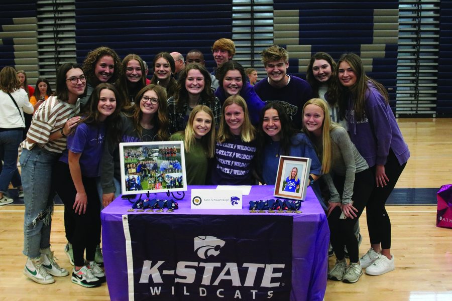 Senior Katie Schwartzkopf and her friends gather together to take a group photo.
