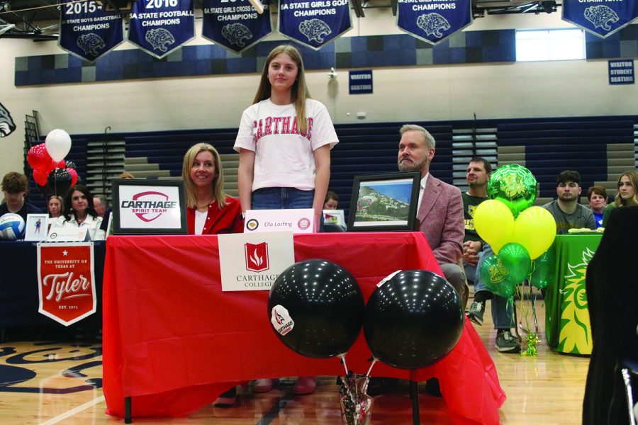 Senior Ella Lorfing signs to dance at Carthage College.
