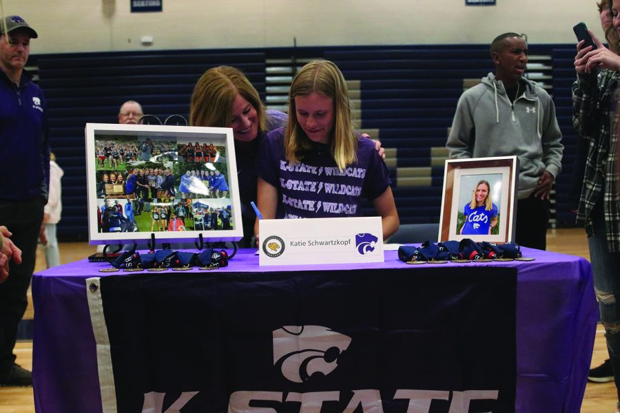 Senior Katie Schwartzkopf signs to attend Kansas State University for cross country.
