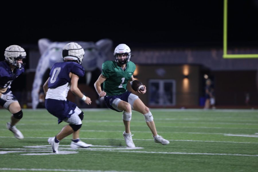 Bracing for a hit, a player leans into the defender.