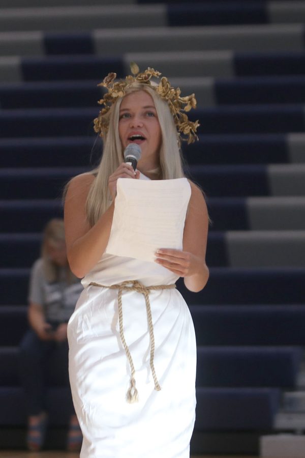 In the main gym, student body president senior Brianna Coup gives a speech welcoming the freshmen class. 
