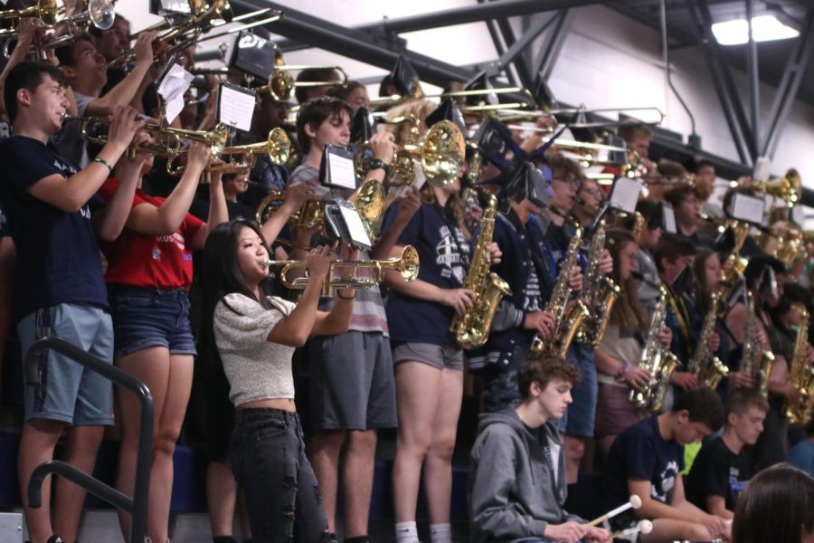 Along with the other band members, sophomore Alivia Thatlor plays the trumpet during the pep assembly.