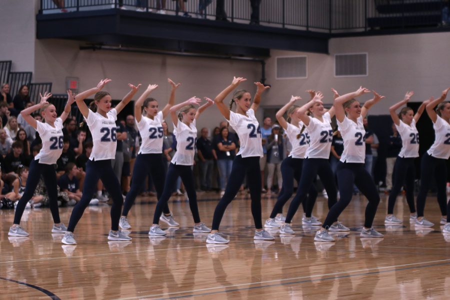 Striking their ending pose, the Silver Stars finish their routine.