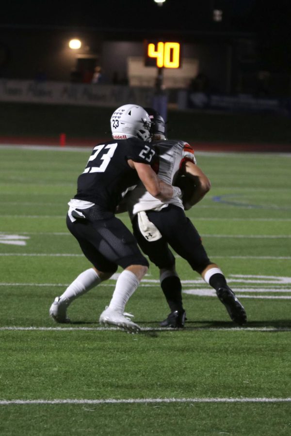 Senior Holden Zigmant pulls his opponent to the ground.