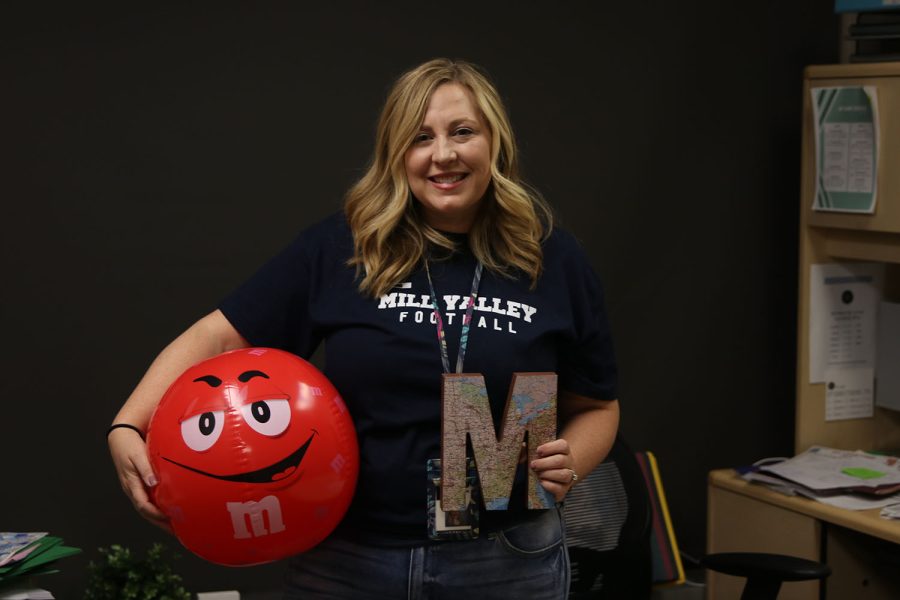 Standing in her office, counselor Megan Mixon holds two items that are meaningful to her Friday, September 2. Coming from Piper High School, she looks forward to the school year ahead. “I have an ‘M’ sign… I really like it because it reminds me of my family,” Mixon said. 
