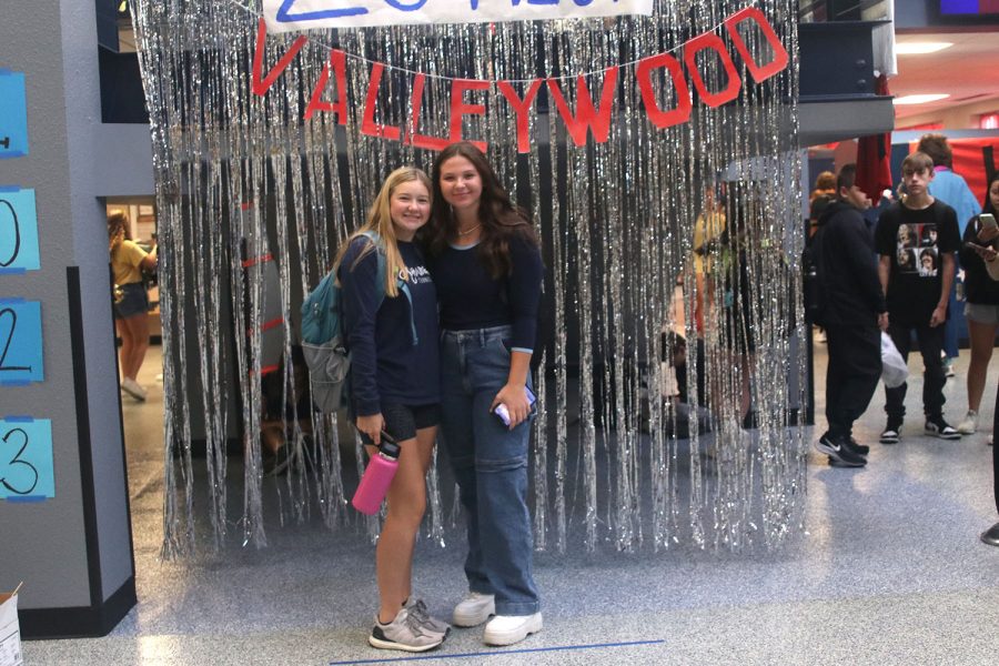 Showing off their class colors, seniors Haley Bryant and Adisyn Hopkins pose for a picture.