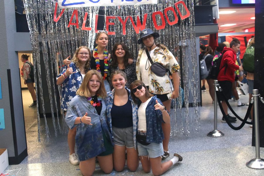 Embracing the Tacky Tourist look, a group of freshman girls pose for a picture.