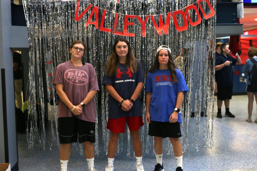 Doing their best straight face, juniors Lucy Roy, Kynley Verdict and Ellie Walker stand in their best Adam Sandler pose.