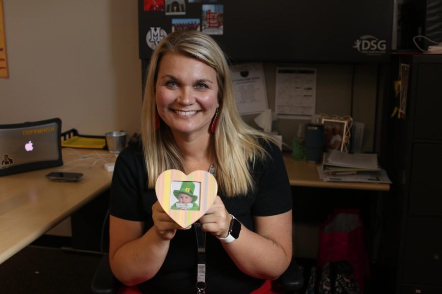 Looking toward room for new development, Shelly Domnanish holds up a photo of her daughter on Thursday, September 1st. 