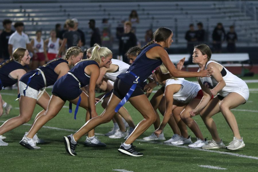 On the line, senior Madison McClure and junior Kate Pfeister line up face-to-face against each other.
