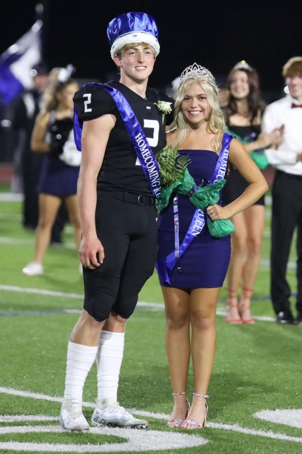 Senior Homecoming queen Bri Coup and senior Homecoming king Hayden Jay smile for a picture after their crowing.