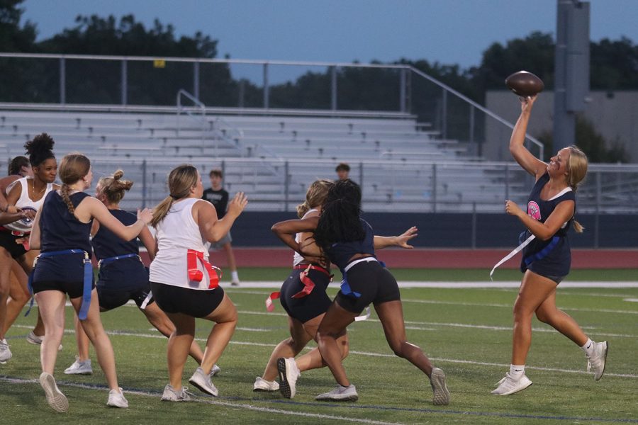 Ball in hand, senior Avery Blubaugh prepares to pass the ball.