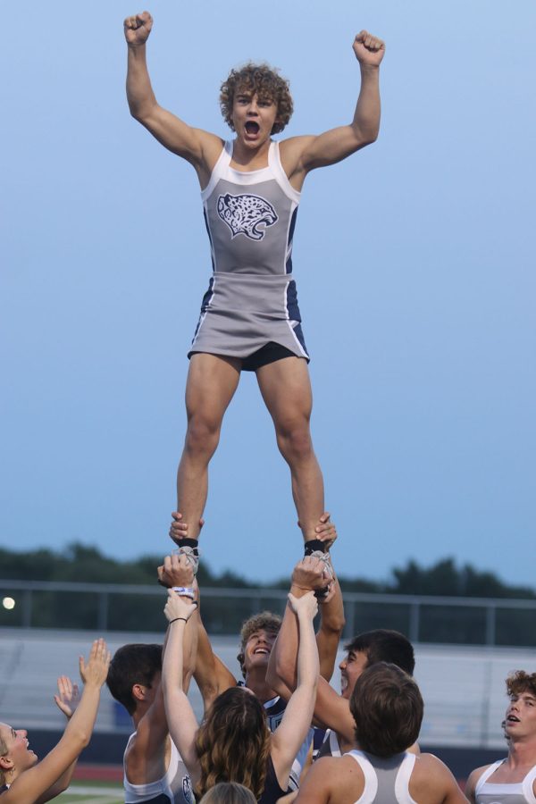 Junior Brady Mason poses on top of the stunt pyramid.