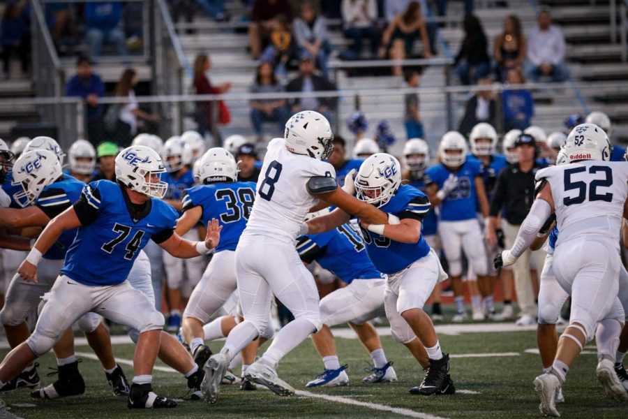 Junior Truman Griffith locks arms with a Gardner-Edgerton lineman.