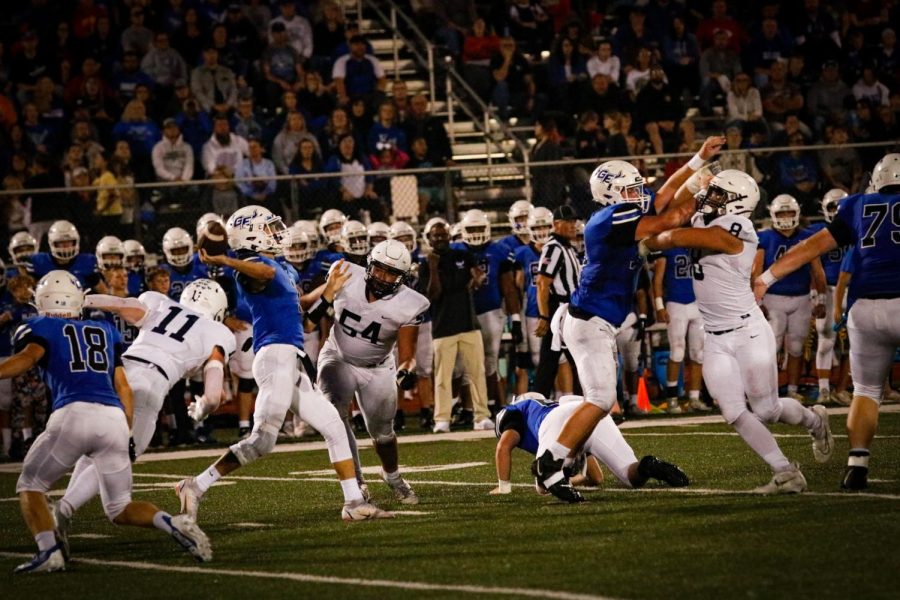 Starting the play, Gardner-Edgerton makes an attempt to complete a touchdown.