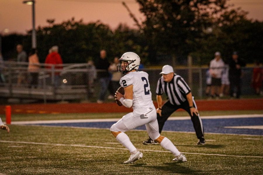 Senior quarterback Hayden Jay gets ready to pass the ball to the other offensive players.