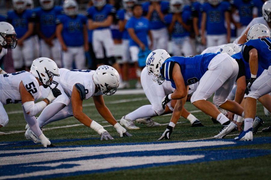 Both teams get prepared for their next play.