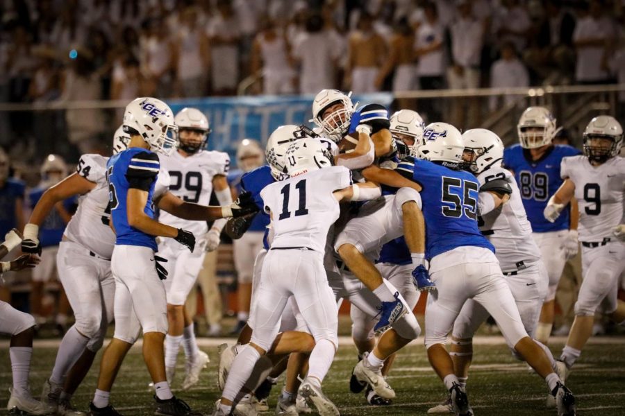 Mill Valley players successfully keep Gardner-Edgerton away from their endzone on Sept. 23.