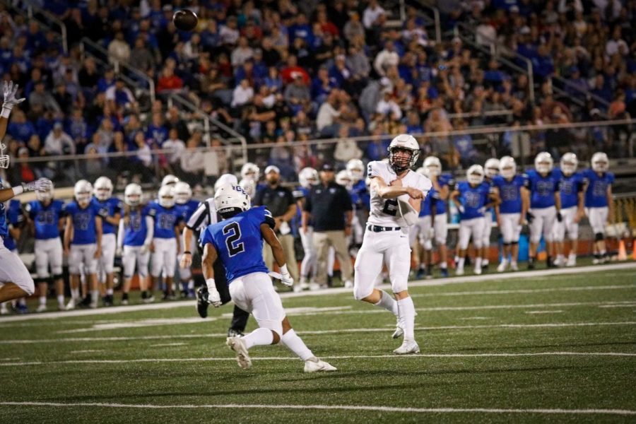 Senior quarterback Hayden Jay throws the ball to a fellow teammate.