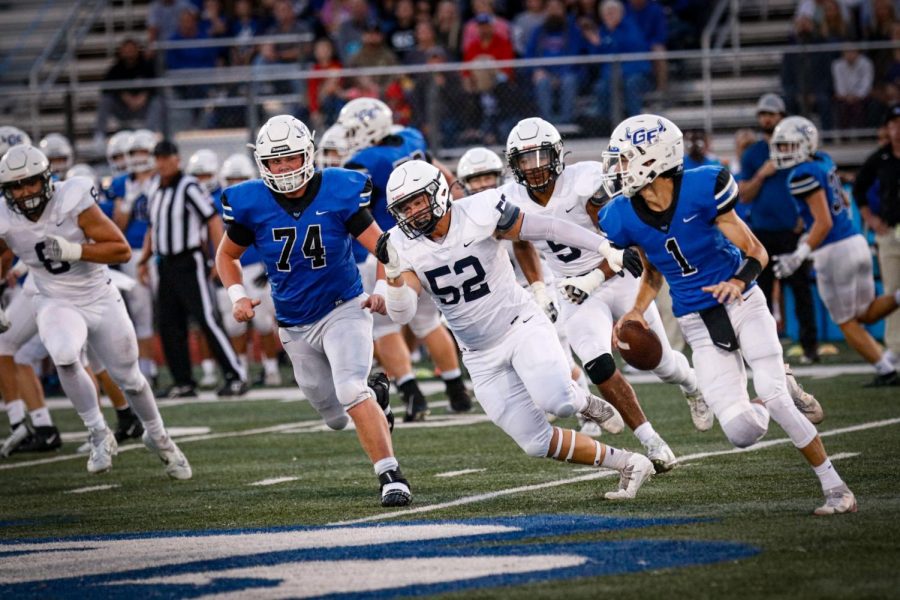 Defensive Lineman senior Grant Rutkowski eyes the Gardner-Edgerton quarterback.