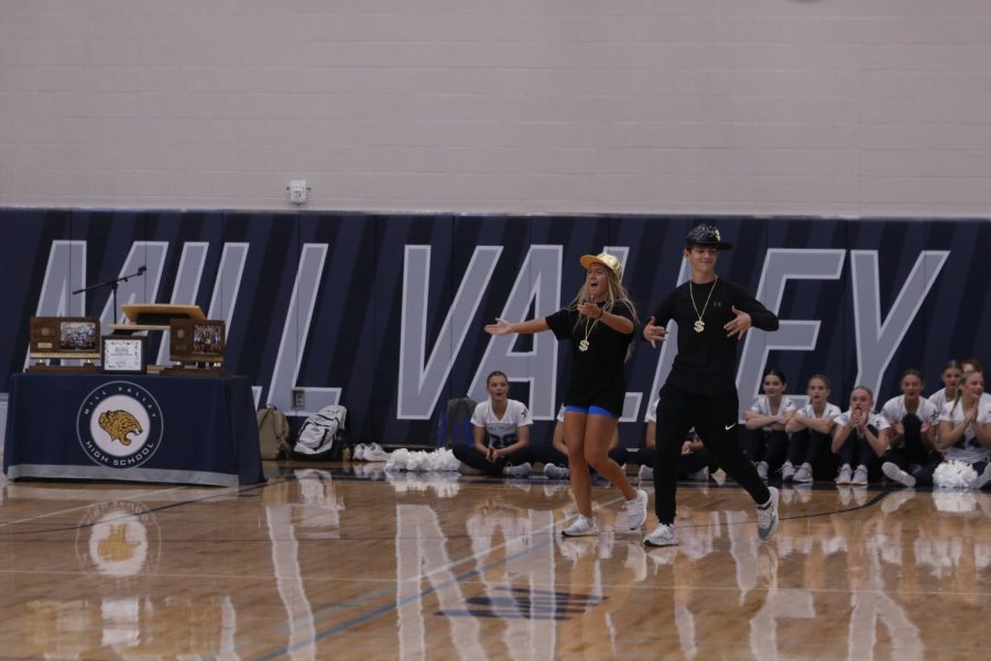 Senior Homecoming candidates Lucas Robins and Sophie Pringle walk on to perform their dance to “Price Tag.” 
