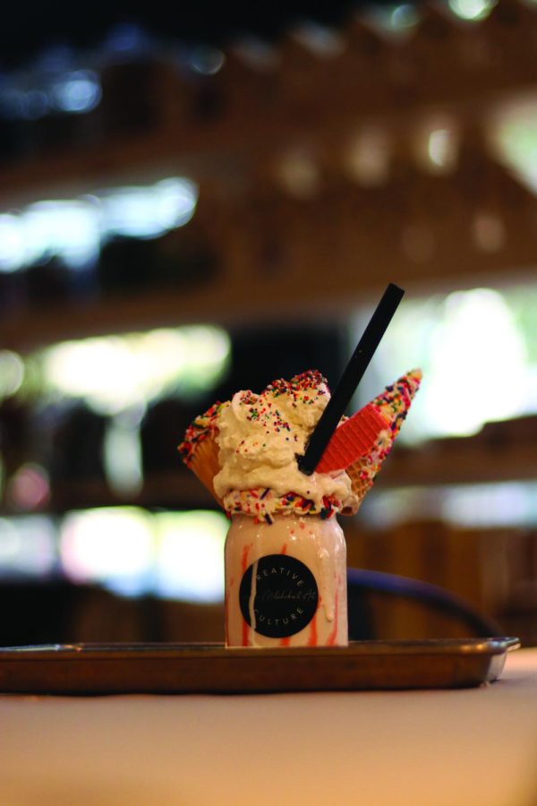 The Life of the Party milkshake includes birthday cake ice cream, whipped cream, rainbow sprinkles, a vanilla cupcake, dipped waffle cone and a strawberry wafer.
