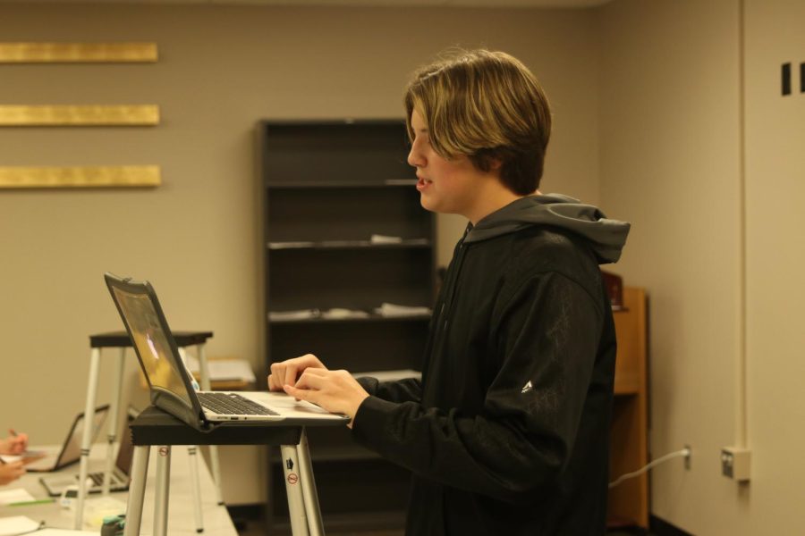 Practicing for the debate tournament, freshman Barron Fox reads a pre-written speech Friday, Sept 23. 
