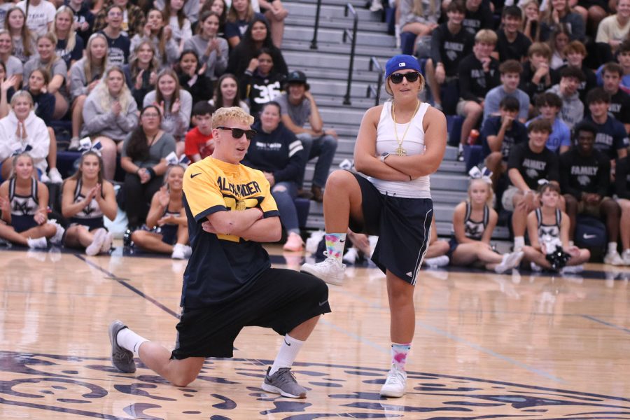 After their dance, senior Homecoming candidates Mikey Bergeron and Avery Blubaugh pose for the judges.