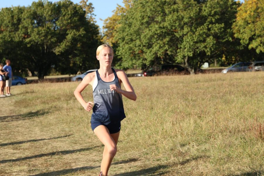 Ahead of her competition, sophomore Charlotte Caldwell runs in the Mark Chipman Classic.