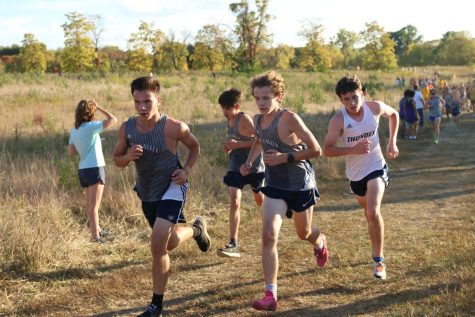 Together, junior AJ Lauer, sophomore Colin Devery and freshman Max Reynolds race in the Mark Chipman Classic.